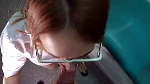 The doctor casually began giving a handjob to the patient during the appointment, kneeling for facial cumshot with glasses on.
