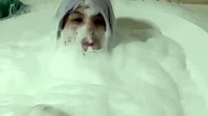 Cyno enjoys a solo bubble bath in fun costumes during this cosplay session.