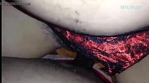 Ebony girl fucked with condom and red panties