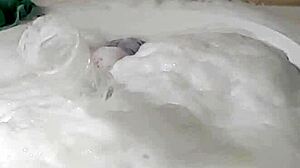 Cyno enjoys a solo bubble bath in fun costumes during this cosplay session.