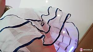 Sexy hot slut Lilith Liber moans while fucking with glass dildo on bed. Close-up views show wet tits and long hair.