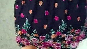 I follow and lift the woman's skirt on the street