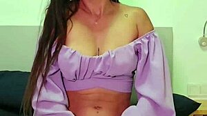 brunette stretches her tight ass with massive anal toys