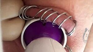 horny babe toys pierced pussy with dildo