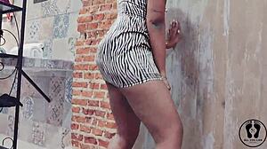 why is that ebony stripper ripping clothes twerking big tits?