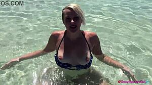 Bikini Model Receives Cumshot on Tits at Beach