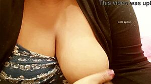 my asian sexy aunty with big tits shows them to me