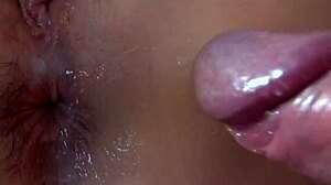 Detailed close-up of ass fucking leading to squirting and creampie