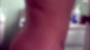 Social club where brunette strips and dances seductively