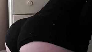 Social club where brunette strips and dances seductively