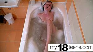 Can this redhead babe reach orgasm in the bath with closeup view?