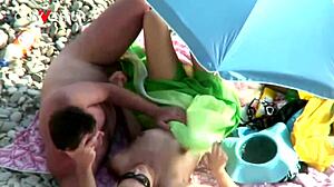 Playful Milf Teases Husband On Nude Beach While Flashing Her Small Tits To Voyeurs