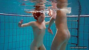 i'm one of two hot lesbians in the pool, underwater with blonde.