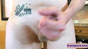 The inked trans beauty jerks her cock on the floor