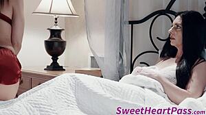 milf seduces young babe and uses strapon in garage