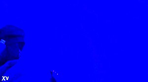 in this blacklight fetish video, she gives a footjob with her sexy toes under the glow