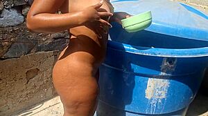 Brazilian ebony spreads big ass on street for public assfucking