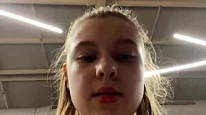 Young Woman Trains And Fingers In Gym