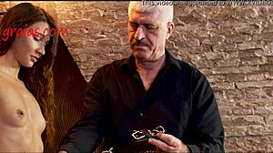 I'm prepping her for the whip in this intense session.