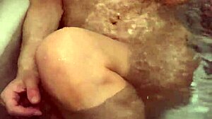 Married 38-year-old housewife with beautiful breasts takes bath!