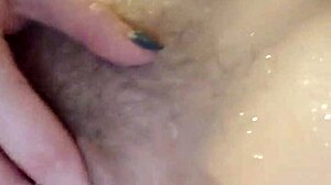 blonde milf teases with dildo in steamy shower session