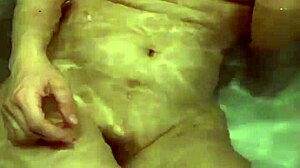 Married 38-year-old housewife with beautiful breasts takes bath!