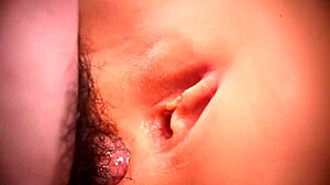 Her ass pleases me with handjob and anal close-up