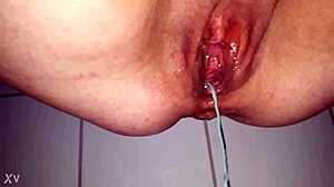 German amateur engages in piss fetish with close-up details and explicit actions