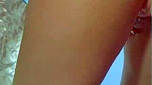 Suggestive-Neutral college desi with sexy dress and sneakers plays with glass dildo