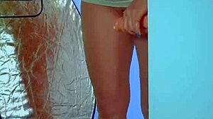 Suggestive-Neutral college desi with sexy dress and sneakers plays with glass dildo