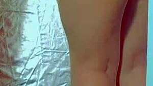 Suggestive-Neutral college desi with sexy dress and sneakers plays with glass dildo