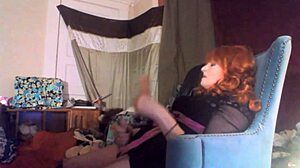 Watch sexy redhead tranny Ms Head swallow her vibrating dildo!