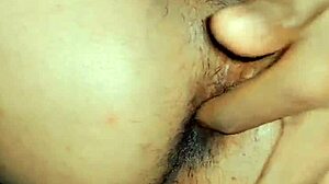 this feminine sissy starts with a finger in his tight asshole. then he stands to piss while oiled up in homemade fun.