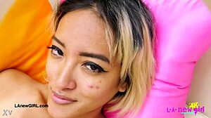 Gorgeous asian model poses and reveals her elegant figure