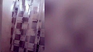 this cute latina teen with tattoos steps into the shower for a steamy bathing session showing off her tits on webcam