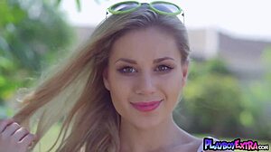 skinny big boobed blonde teen alice takes off her white polkadot bikini outdoors. she strips slowly, revealing natural tits in a softcore solo tease.