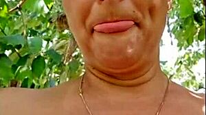 Hot blonde shows off outside the house. Her natural style shines in the fresh air.