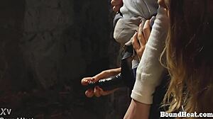 busty lesbian slave preps for big black strapon action on her pussy! 🔥😈