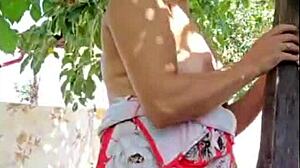 Hot blonde shows off outside the house. Her natural style shines in the fresh air.