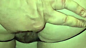 stepmother strips down revealing her new thong and big tits