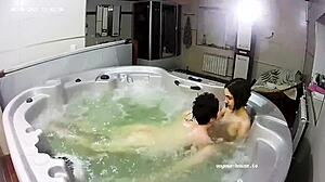 Young lesbian couple enjoys bath with intimate fingering