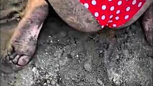 public sex on mexican beach with petite latina babe giving handjob and blowjob to muscular stud's monster cock.