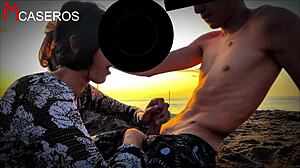 public sex on mexican beach with petite latina babe giving handjob and blowjob to muscular stud's monster cock.