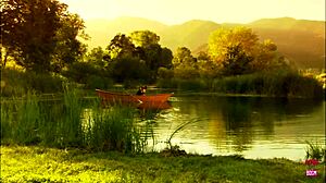 This lovely couple really banged outdoors right in the middle of a lake on a small boat