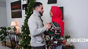even during festive times, this arab girlfriend keeps her hijab on while sharing intimate moments with her boyfriend.