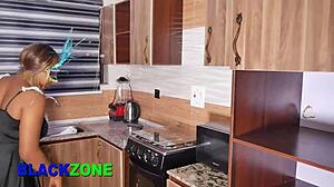 Step mom with curvy ebony body and fat belly fingers herself close up in kitchen as lover watches