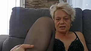 this amateur mature milf in lingerie teases with her panties in a solo softcore display whispering coucou mon chéri tu aimes ma lingerie du jour moi j'adore