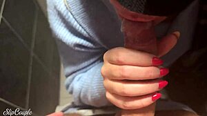 Watch this cute babe spit and deepthroat my big cock in public toilet after sneaky handjob under fast food table!