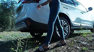 Why did Tina in blue jeans stop for an urgent outdoor pee and then suck that big cock?