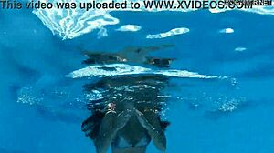 Hey there, beautiful big breasted Angelica Heart in bikini by the pool with her friend.